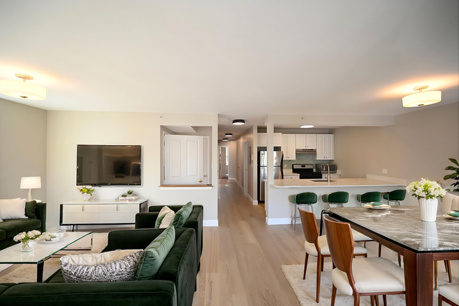 Living and Dining - virtually staged - Spacious 2-Level 5BR I 3BA Renovated Condo I Bonus Kitchenette Suite Steps from Orange Line T