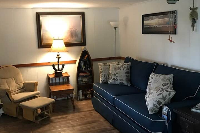 Living room - Furnished 2 bedroom cottage walk to  private beach. Bike path access. Washer dryer in unit House
