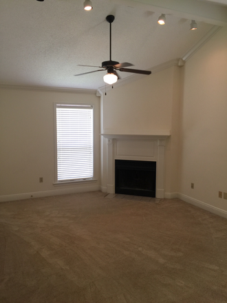Fireplace in living room - Beau Chene Condominiums