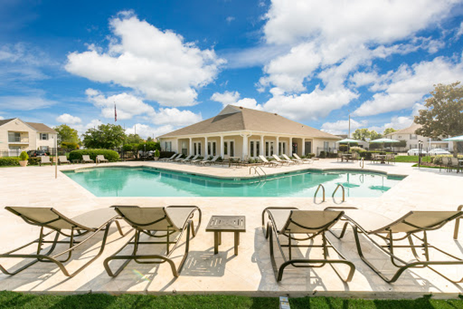 Pool area - Laurel Park - Conveniently located in Flowood with a $25 monthly discount! Apartments