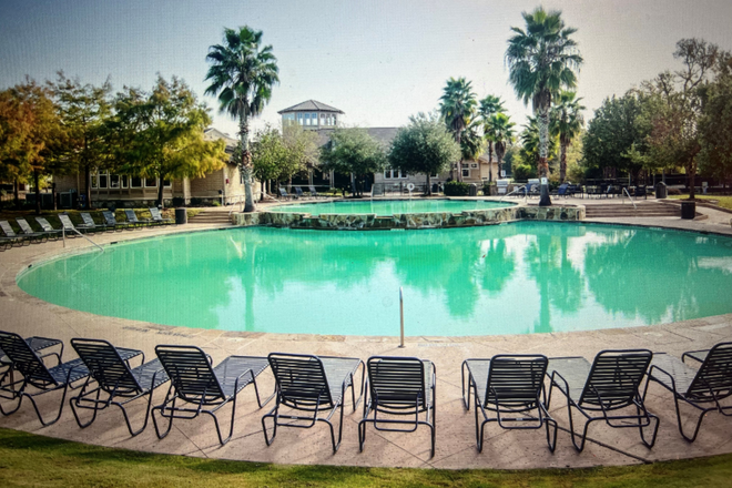 The Woodlands of College Station main community building w/admin. office, 24-hour gym, and pool area. - Must Re-Let! Woodlands of Coll. Sta. prem. apt! Will pay 1st & 7th mo. rent of 7-mo. lease (Jan-July