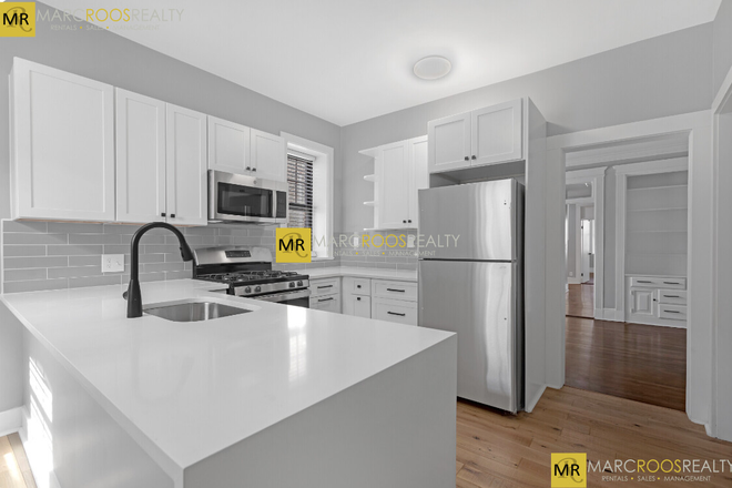 Call call or text Arezou at 617-584-7817 - Absolutely stunning renovated 4 bed 2 bath in heart of Allston!!! Heat and Hot water Inc.! Condo