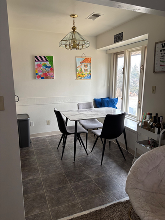 Kitchen table with window seat facing main street - Spring sublease! $1100 but VERY negotiable. Bedroom with private bathroom on the hill! Apartments