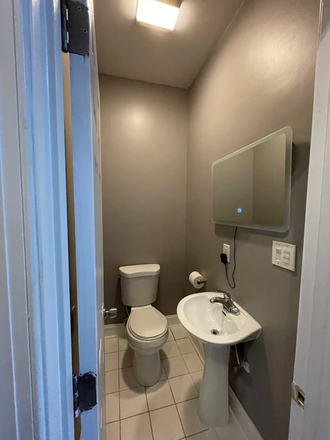 Half Bathroom - Charming 1BR / 1.5BA Apartment in Historic Reservoir Hill