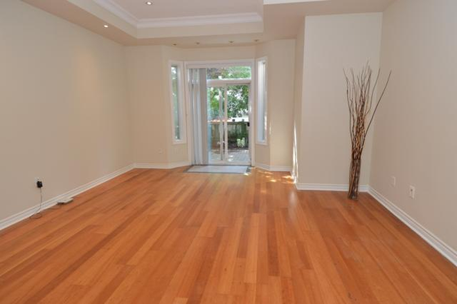 Open Concept Living & Dining Area - Executive 2-Bedroom Townhouse