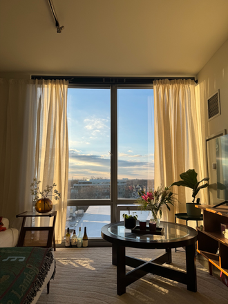 living room during golden hour - Cozy, Light-Filled 1B1B Summer Sublet | Fully Furnished + Sunset Views