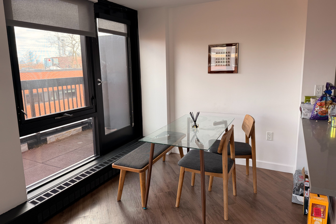 Dining area with private balcony - 2B/1B Soldiers Field Park Apartment on HBS Campus