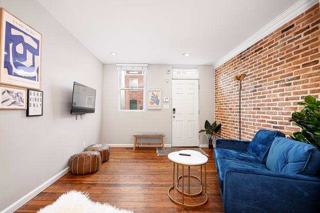 Living room - All-inclusive living: 15 min walk from JHU Medical Center (shuttle accessible) Townhome