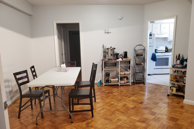 dining area with a view of the kitchen to the right - Charming 2BR/1BA in the Heart of Georgetown – Minutes to Dupont Circle! Condo