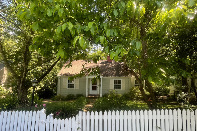 Front of house - Private lower ground apartment in green, serene setting.
