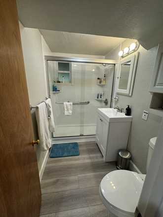 Hallway bathroom 1 - 11th and Aurora Duplex for Rent- 2 bedrooms 2 bathrooms. Off street parking with yard. Duplex
