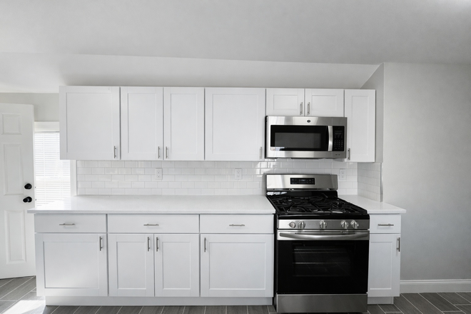 kitchen - remarkable newly designed three bedroom, one bathroom on second floor with additional space Apartments