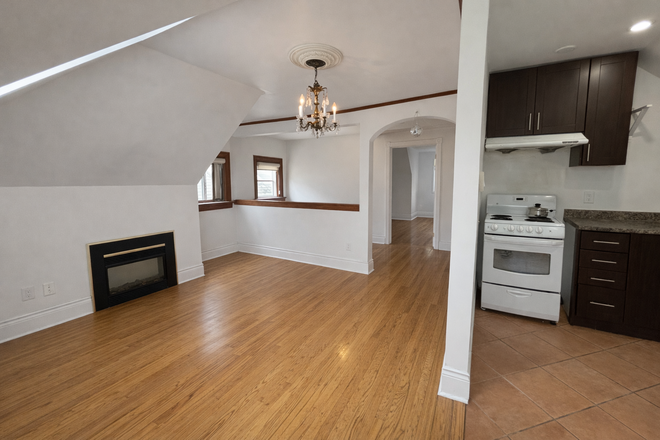 Living Room - 157 Spadina Rd #4: Bright 2-Bedroom Loft with Private Deck in the Heart of the Annex