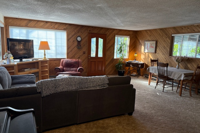 living / dining - Room in clean and quiet neighborhood off campus. Private bath, parking, internet and utilit.