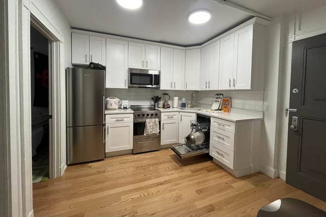 Kitchen - Charming Unit in Historic Building with Modern Touches and Cozy Fireplace - All Utilities Included Apartments