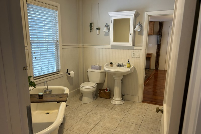 tile bathroom with tub and shower - Available 9/1 2+ Bedroom apt in Historic Hatfield Home