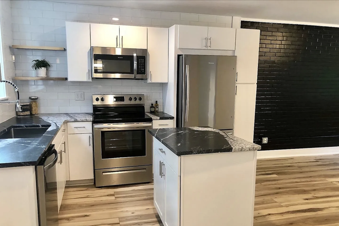 Kitchen - FULL townhome. Walking distance to UNC and Franklin St with parking. 3 bed, 2.5 renovated bath
