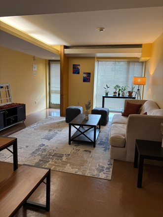 Bright and spacious living room. More photos available upon request. - 29 Garden Street Apartments