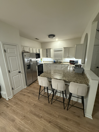 Kitchen with lots of storage, comes furnished but feel free to add! - Private Room on Mud Island! (Female Roommate Wanted) House