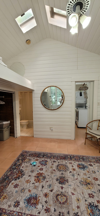 MAIN ROOM LOOKS INTO KITCHEN AND BATH - Studio cottage on lush private Coconut Grove lane.  Gated yard. Apartments