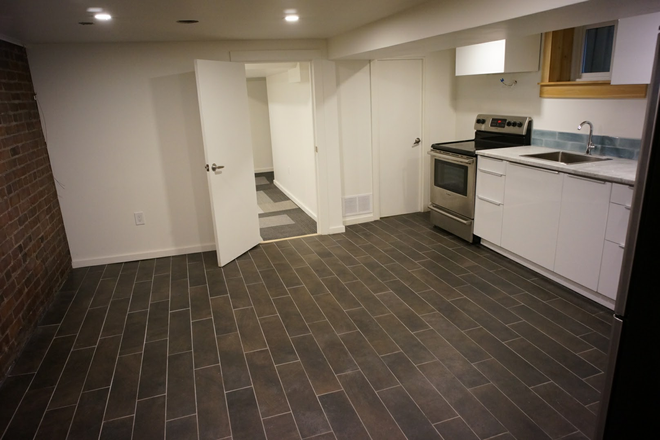 Kitchen and bedroom entrance - Upper Beaches all utilities included one bedroom basement appartment House