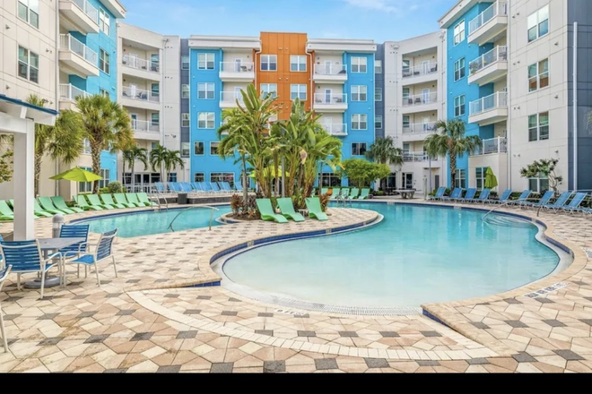 Outdoor Pool - IQ Luxury Apartments