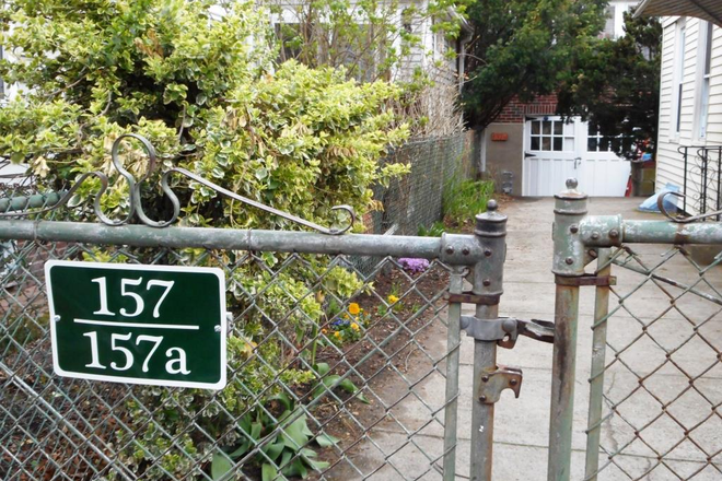 gate at the sidewalk - 1-bedroom apartment in Cambridgeport two-family, ideal location, lots of privacy, yard and laundry.