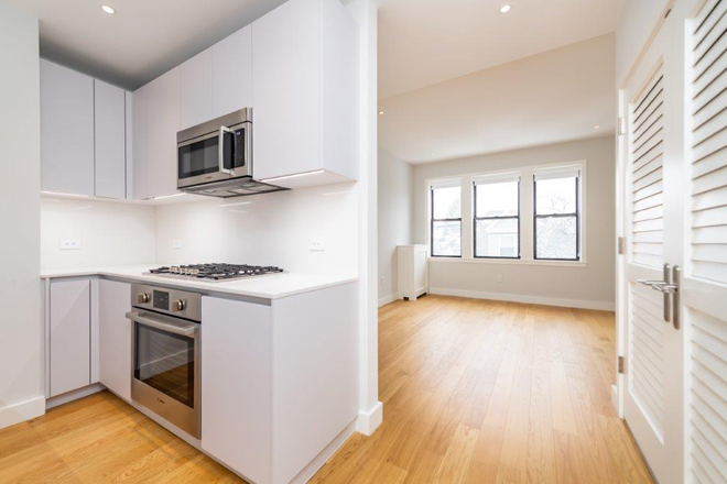 Visit hubrealtyproperties.com - Clean and sleek 1.5 bedroom apartment, around corner from campus
