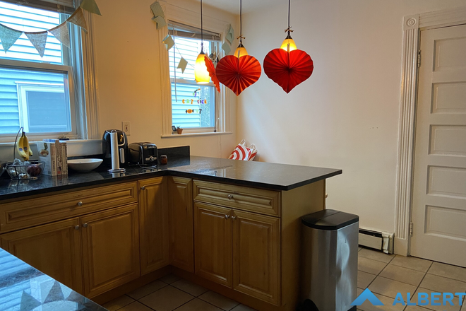 Kitchen - Cozy 4-bedroom with Laundry in-unit!! Apartments