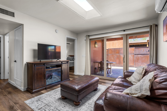 Living Room with Electric Fireplace - Fully Furnished Home Close to Campus All Utilities Included