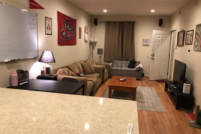 living room - 2 Room available from 8/1/2025. Fully furnished all boys unit. Duplex