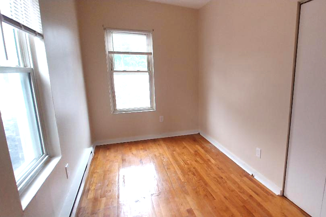 Visit hubrealtyproperties.com - Mission Hill, nice two bedroom with living room Apartments