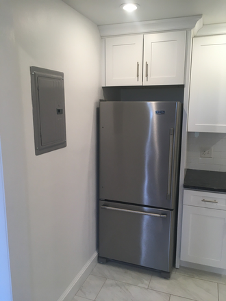 Visit hubrealtyproperties.com - On the Green line T, gorgeous 2 bedroom with dining room, on a tree lined street Apartments