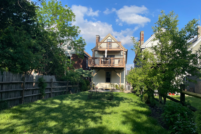 Back of home / yard - 2 bedroom apartment, with 3rd bedroom option within walking distance to all UC has to offer!!