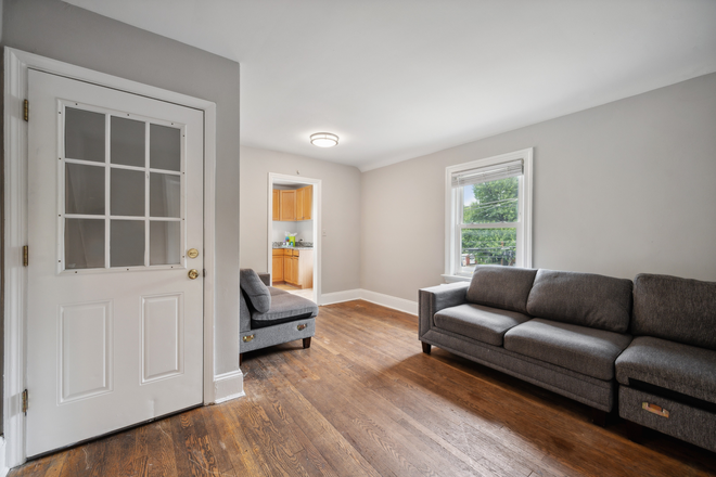 Living room - 4504 Guilford Rd (College Park, MD) Apartments