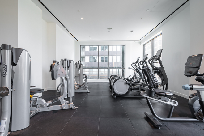 Gym - cardio - Furnished 1-Bedroom + Large Den/2-Bath Condo with Direct Subway Access at Yonge & Eglinton