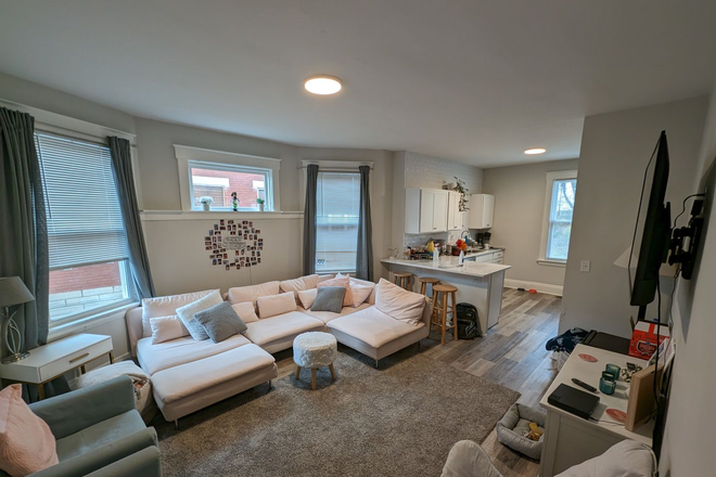 Living Room Occupied - Comfortable and Remodeled, 2 Bedroom Walk to Campus on Spencer Ave Avail July '27 Duplex