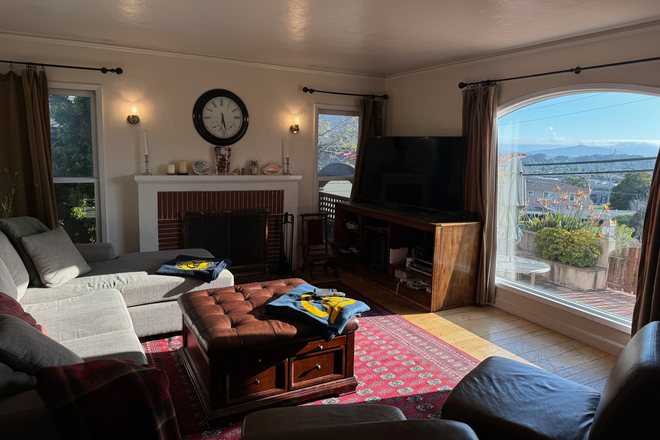Living room - view - Beautiful remodeled 3/2 Mediterranean home with bay view, spa & walkable to BART