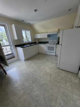 Kitchen with view to your small porch - 26 Morton. 3rd floor walk up,  1 bedroom, walk to campus Triplex