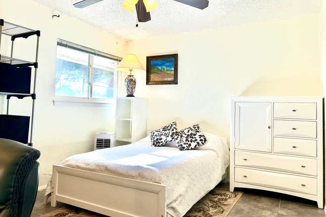 Bed, Window - Private room and, shard big studio garage room . at Melrose Drive for rent.